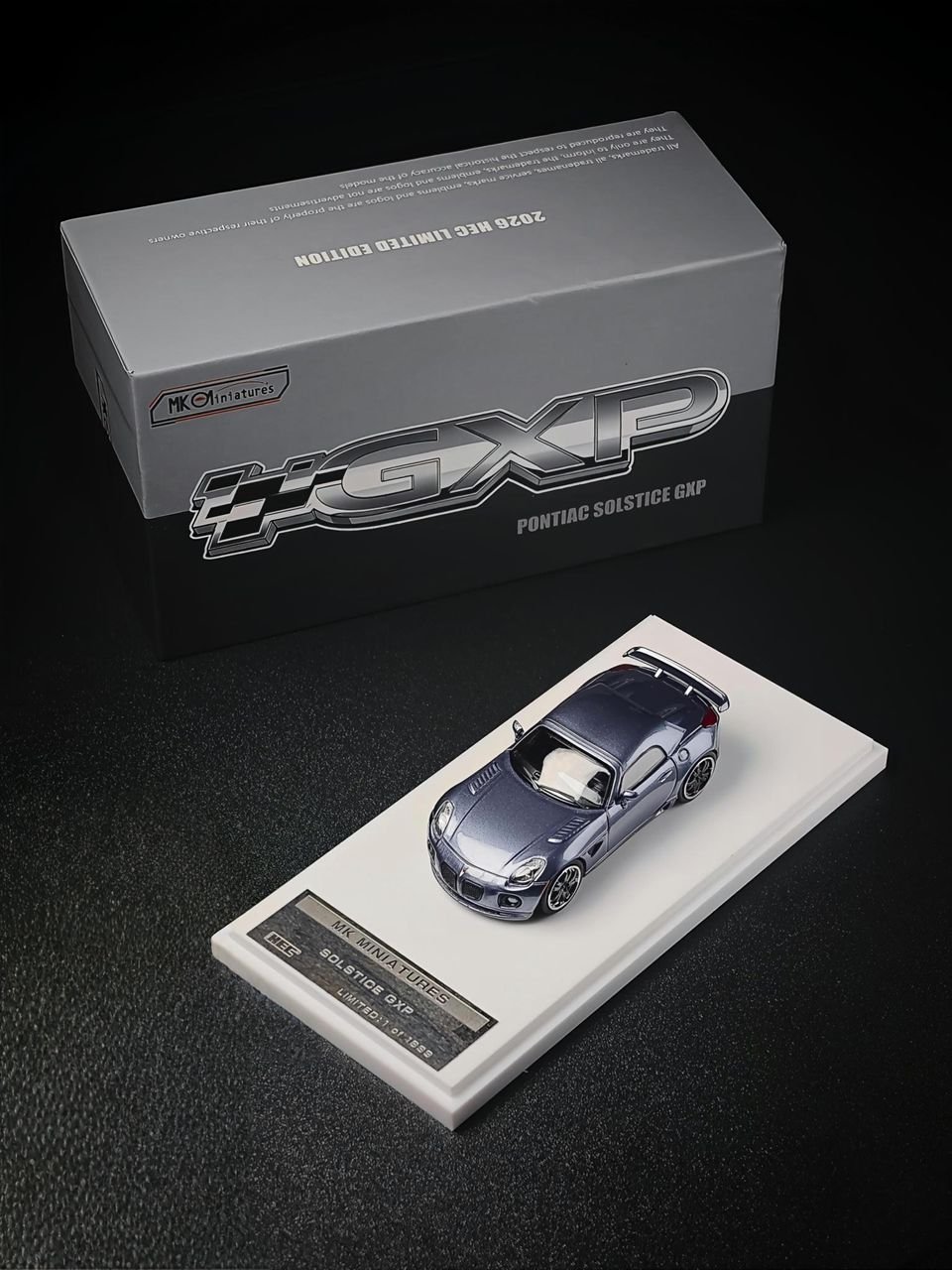 WhatsApp Image 2026-07-30 at 5.04.17 PM (3) MK Miniatures 1/64 2009 Pontiac Solstice GXP Blue Grey HEC Exclusive - Image 1