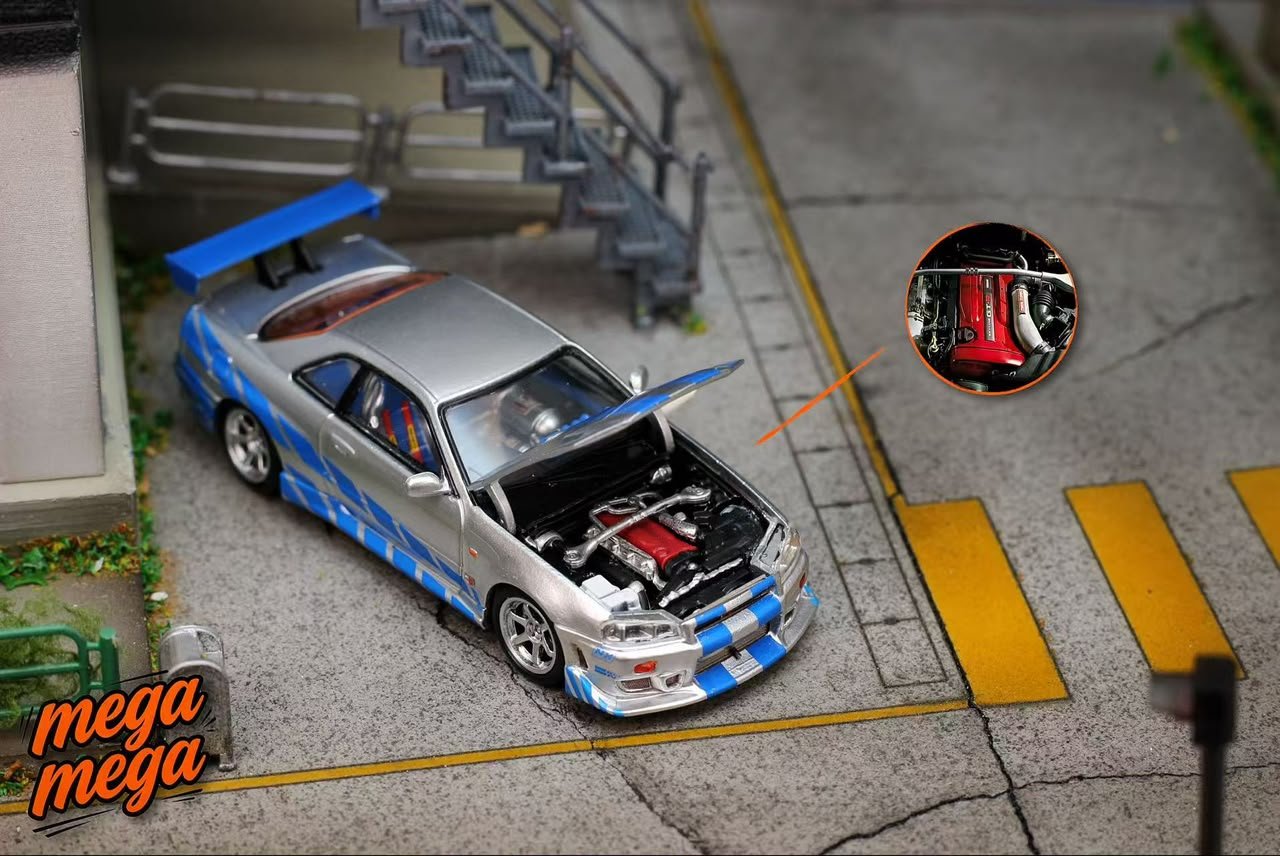 IMG-20260820-WA0063 (Pre-order) Mega Mega Skyline GT-R R34 Movie Version Silver Blue (ETA Nov 2026) - Image 1