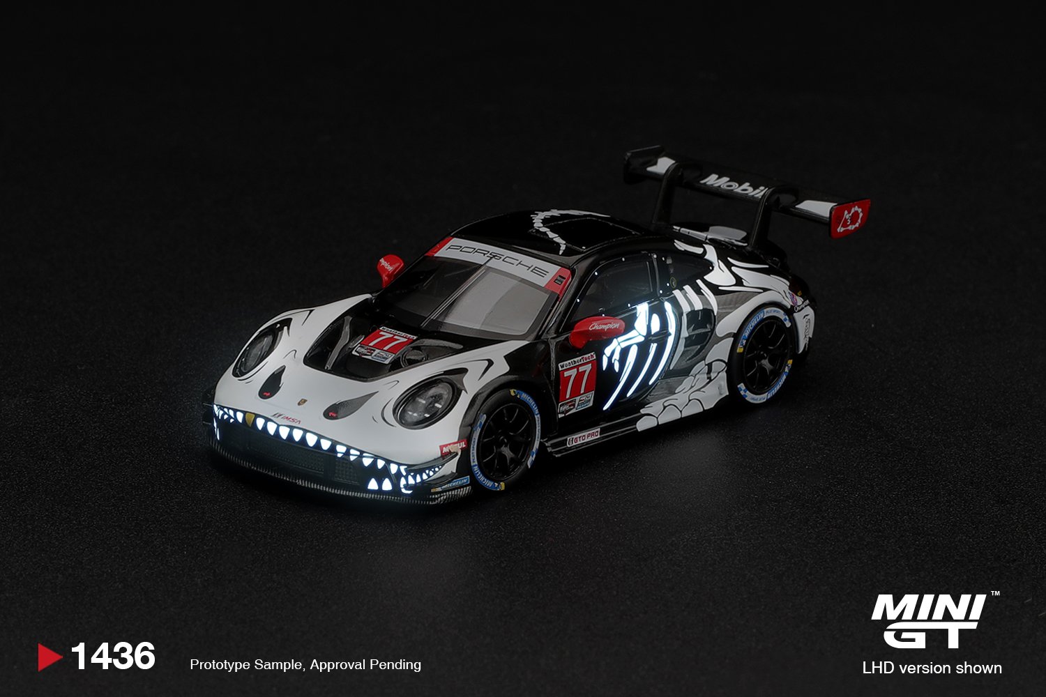 1792646985_prdpg_6ad99f49ec31c (PREORDER) PORSCHE 911 GT3 R (992) #77 AO RACING "SKELETON REXY" 2026 IMSA PETIT LE MANS BLISTER PACKAGING (ETA June 2027) - Image 1